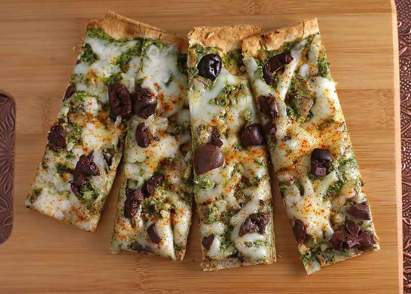 Low Calorie Flatbread Low calorie flatbread sliced into strips with mushrooms and greens