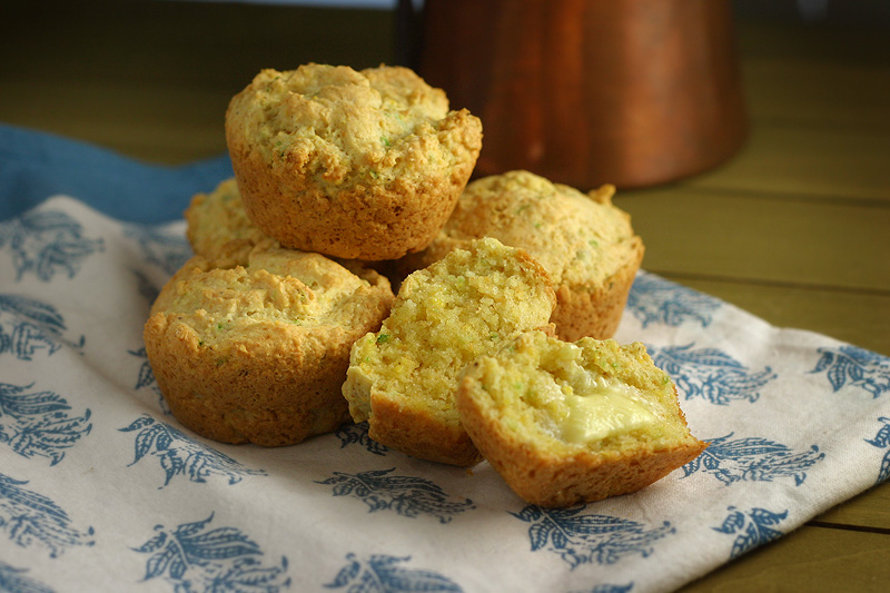 Cornbread Muffins Jalapeño cornbread muffins with one muffin split open