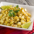 Cilantro lime potatoes with crumbled cheese and a lime wedge